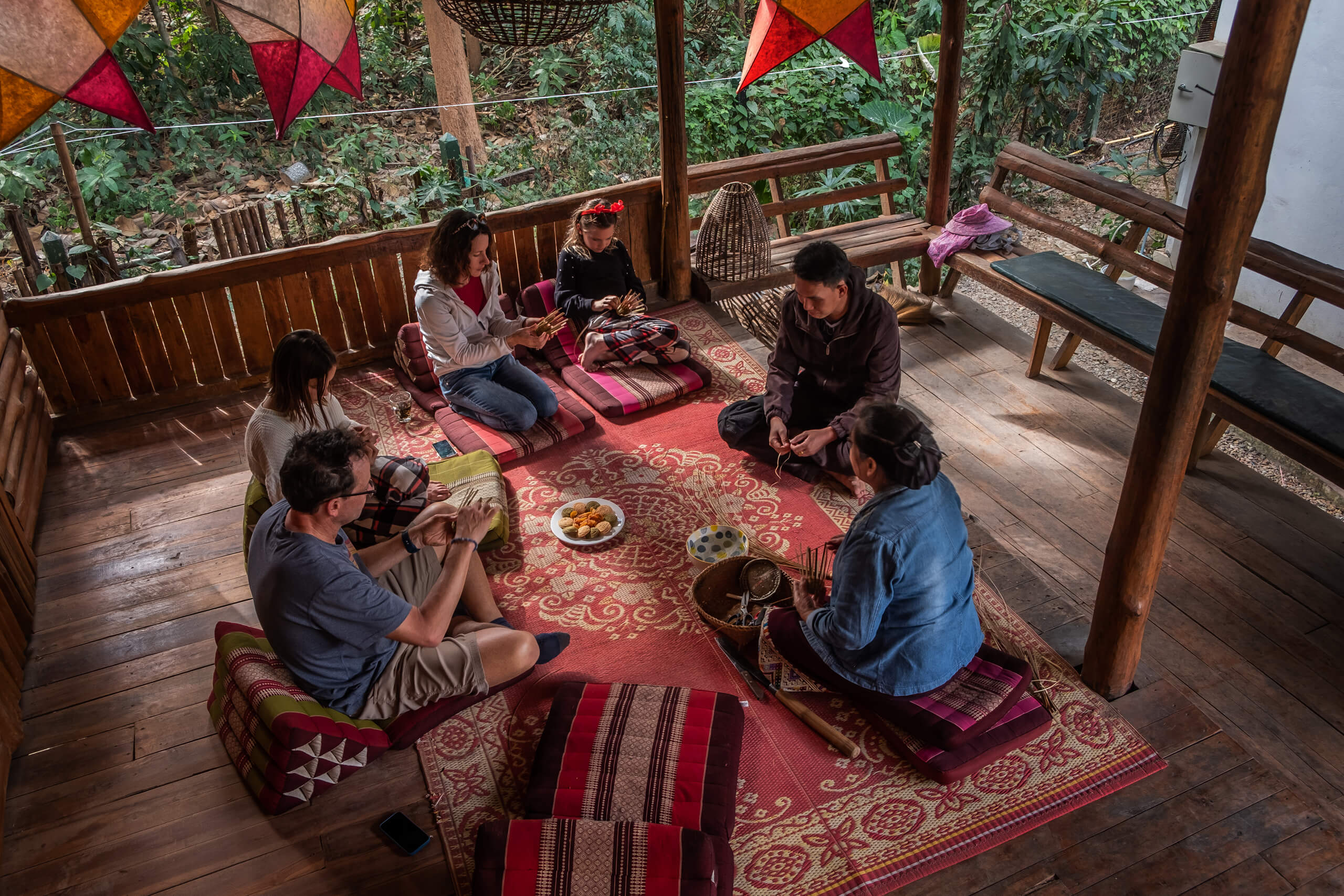 A family making bamboo baskets in Luang Prabang.