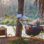 A hammock by a river in Luang Prabang.