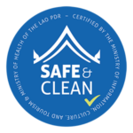 The safe and clean logo on a blue background in Luang Prabang.