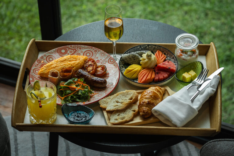 Enjoying the breakfast in Room