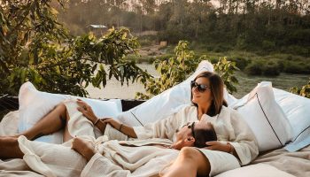 Couple Escape next to river